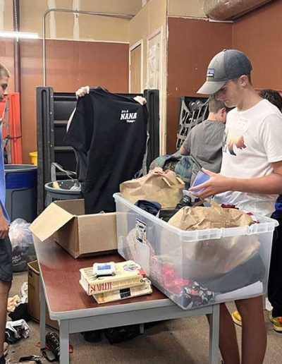 Volunteers helping sort items at Hangers of Hope Thrift Stores Benefiting the Bethesda Health Clinic in Tyler, TX