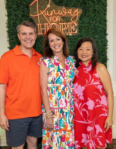 People standing for a picture at the Runway for Hope at Hangers of Hope Thrift Stores Benefiting the Bethesda Health Clinic in Tyler, TX