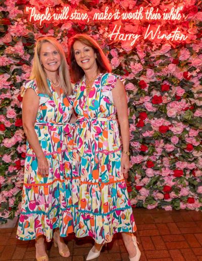 People standing for a picture at the Runway for Hope at Hangers of Hope Thrift Stores Benefiting the Bethesda Health Clinic in Tyler, TX