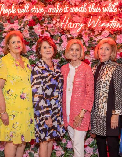 People standing for a picture at the Runway for Hope at Hangers of Hope Thrift Stores Benefiting the Bethesda Health Clinic in Tyler, TX