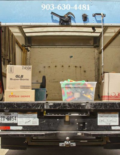 Volunteers unloading a truck at Hangers of Hope Thrift Stores Benefiting the Bethesda Health Clinic in Tyler, TX