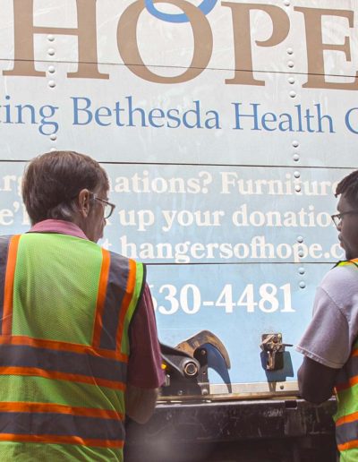 Volunteers unloading a truck at Hangers of Hope Thrift Stores Benefiting the Bethesda Health Clinic in Tyler, TX